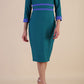 Model wearing Diva catwalk Paeonia dress square neckline with a vent in Pacific Green with Thistle Blue and Pacific Green stripes around the waist and three quarter sleeve with Thistle Blue contrast finish front