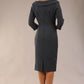 Model wearing Diva catwalk Opulus pencil dress in slate grey with three quarter sleeve figure fitted front image