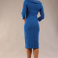 Model wearing Diva catwalk Opulus pencil dress in sapphire blue with three quarter sleeve figure fitted back image