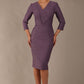 model wearing diva catwalk cranston pencil-skirt dress with low v-neck and tie detail wide band with sleeves in dusty lilac colour (Dusky Lilac)