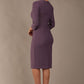 model wearing diva catwalk cranston pencil-skirt dress with low v-neck and tie detail wide band with sleeves in dusty lilac colour (Dusky Lilac)