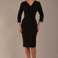 model wearing diva catwalk cranston pencil-skirt dress with low v-neck and tie detail wide band with sleeves in black colour front side (Black)