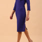 Model wearing Diva catwalk Pieris pencil dress in palace blue with three quarter sleeve figure fitted front side image