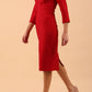 Model wearing Diva catwalk Pieris pencil dress in cardinal red with three quarter sleeve figure fitted front side image