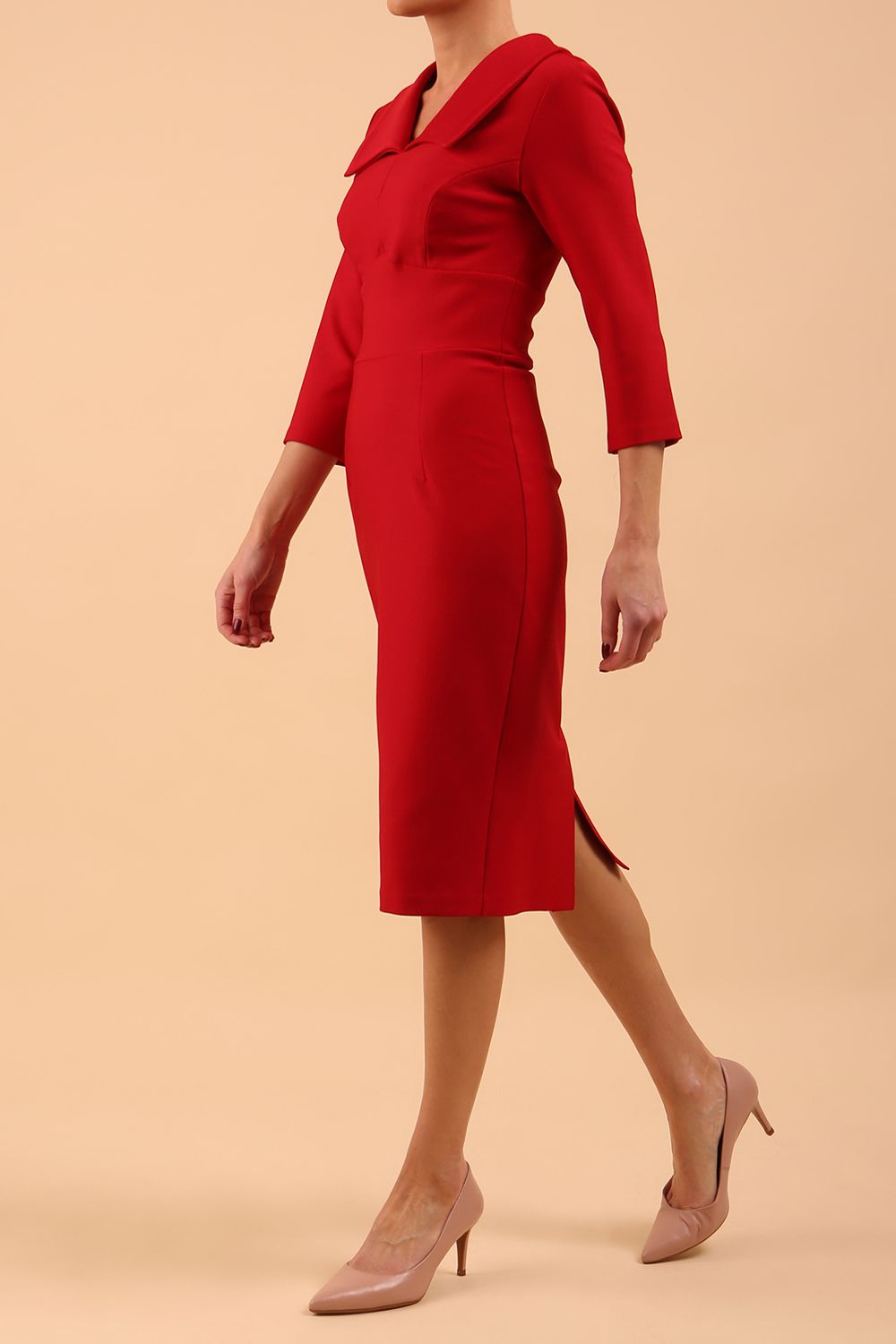 Model wearing Diva catwalk Pieris pencil dress in cardinal red with three quarter sleeve figure fitted front side image