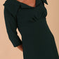Model wearing Diva catwalk Venetia figure fitted pencil dress in forest green with three quarter sleeve front