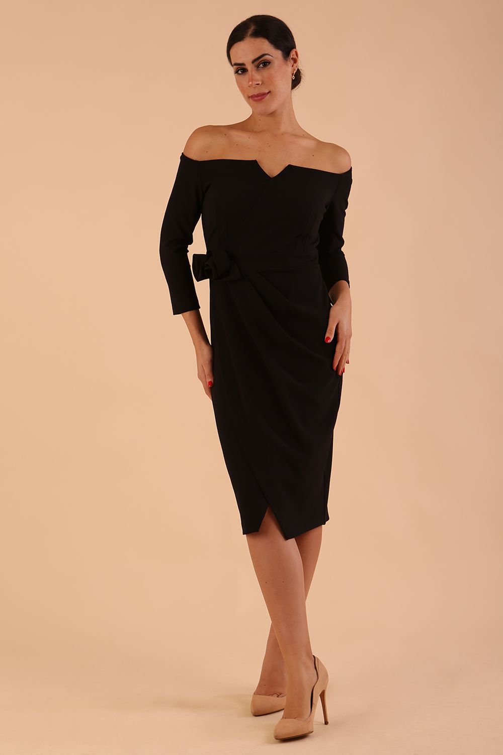 model is wearing diva catwalk charisma dress odd shoulder design with pleated detail down the front and flower detail on a side in black colour