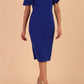 brunette model is wearing diva catwalk hermione pencil dress with tie shoulder details and empire waistline in cobalt blue front