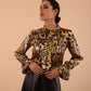 divacatwalk ricky long sleeve animal printed top with a loose tie detail at the front in gold leopard print front