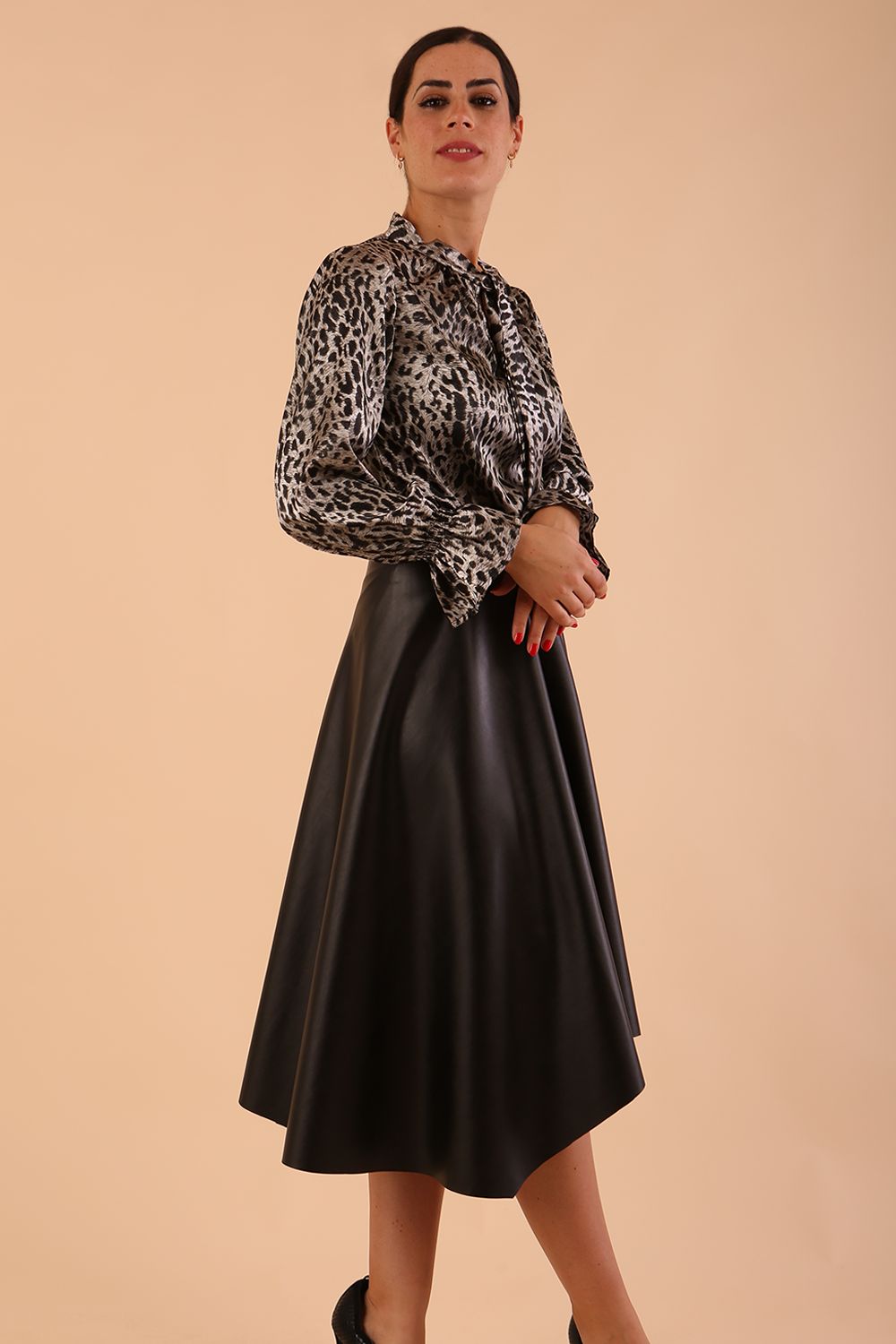 divacatwalk ricky long sleeve animal printed top with a loose tie detail at the front in silver leopard print 