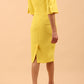 model is wearing divacatwalk chiswick pencil dress rounded neck with short sleeve in blazing yellow back