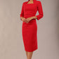 model is wearing diva catwalk plaza sheath dress with high neck Trapezium neckline cutout and three quarter sleeve pretty dress in Scarlet Red colour