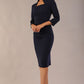 model is wearing diva catwalk plaza sheath dress with high neck Trapezium neckline cutout and three quarter sleeve pretty dress in Navy Blue colour