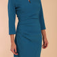 model is wearing diva catwalk chandos sheath dress with three quarter sleeve and slit in the middle of the neckline in teal front
