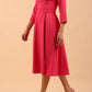 model is wearing a sleeved oversized collar swing dress with button detail at the front and pockets in the skirtmodel is wearing diva catwalk gatsby swing dress with pocket detail and wide v-neck collar and buttons down the front panel in fuchsia pink front