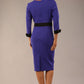 Model wearing diva catwalk Reese 3/4 Sleeved pencil skirt dress with a contrast sleeve and waistband details in Indigo Blue/Black