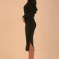 Brunette model wearing a DIVA Catwalk Buffy Puffed Long Sleeve Midi Pencil Dress with high neckline in Obsidian Green