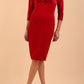 A model is wearing a velvet pencil sweetheart neckline dress by diva catwalk in red