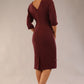 Model wearing the SEED Fulham pencil dress in port royale, showing the clean boat neckline and dolman sleeves (Port Royale)