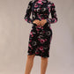 model is wearing a diva catwalk Firenze High-Neck Floral Velvet Wrap Dress long sleeves knee length with ruched sides