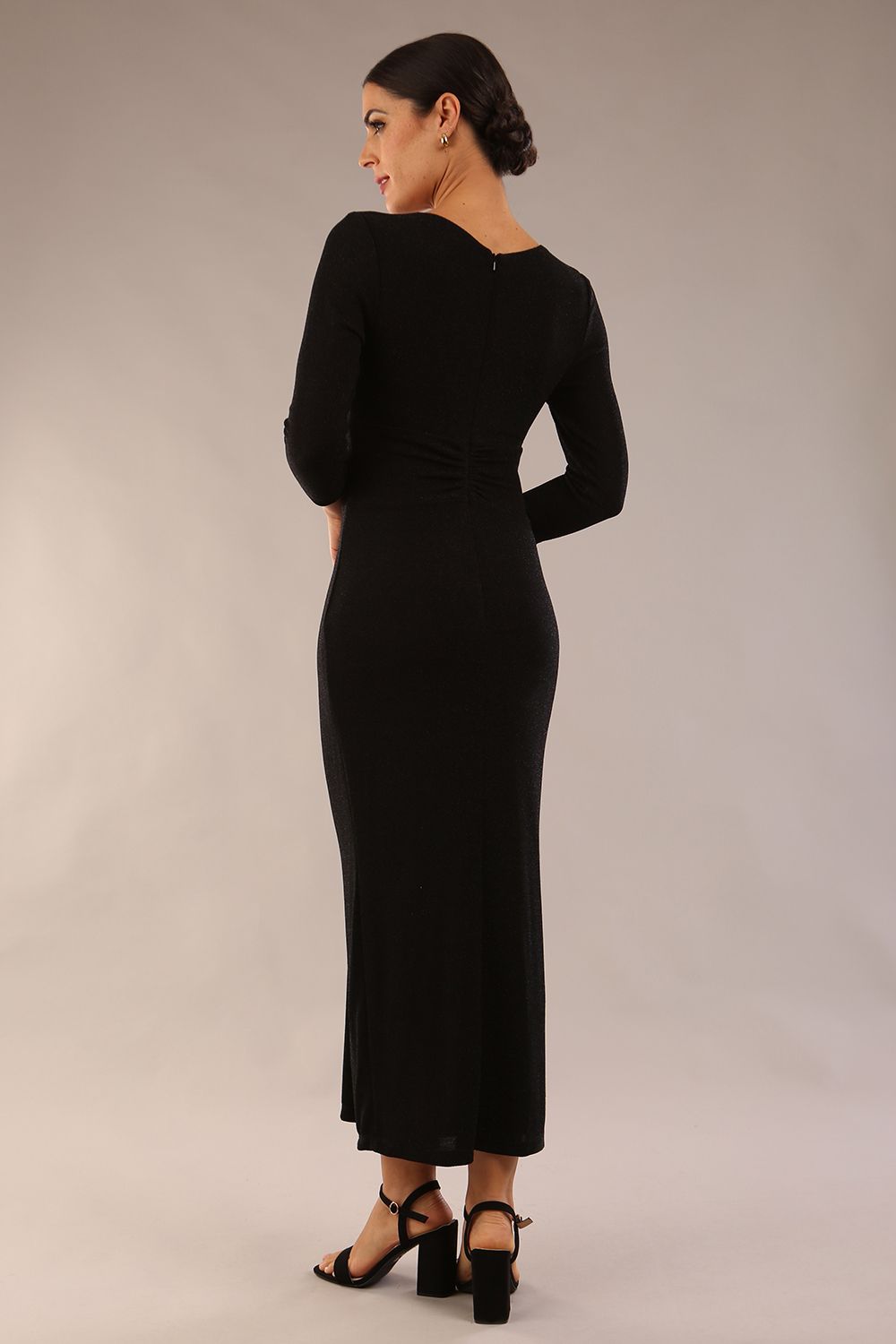 brunette Model is wearing diva catwalk Melody Long Sleeve Sparkle Midaxi Dress in Black back