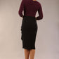 model is wearing diva catwalk contrast pencil dress with sleeve and asymmetric skirt detail in black and burgundy sparkle back