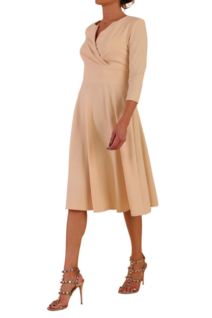 model is wearing diva catwalk january 3/4 sleeves a-line v-neck swing dress in beige front side