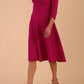 model is wearing diva catwalk january 3/4 sleeves a-line v-neck swing dress in magenta front side