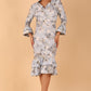 model is wearing diva catwalk fern printed dress with rushes and sleeves in light blue front