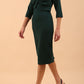 Model wearing Diva Catwalk Lantana Square Neck Pencil Dress 3/4 Sleeve in Forest Green front side