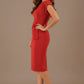 Woman wearing a red dress against a brown background (Tango Red)