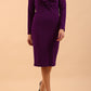 model is wearing diva catwalk gately pencil dress with long sleeves and twisted low v-neck in deep purple front