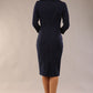 model wearing a diva catwalk  Helium 3/4 Sleeved Pencil Dress with 3/4 sleeve and knee length and bow detail on the neckline in navy blue colour back