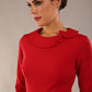 model wearing a diva catwalk  Helium 3/4 Sleeved Pencil Dress with 3/4 sleeve and knee length and bow detail on the neckline in dark red colour
