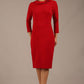 brunette model is wearing a diva catwalk  Helium 3/4 Sleeved Pencil Dress with 3/4 sleeve and knee length and bow detail on the neckline in dark red colour front 