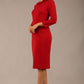 brunette model is wearing a diva catwalk  Helium 3/4 Sleeved Pencil Dress with 3/4 sleeve and knee length and bow detail on the neckline in dark red colour front 