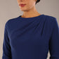 model wearing a diva catwalk Olgivy Long Sleeve Knee Length Pencil Dress round neckline and long sleeve in navy blue colour close up