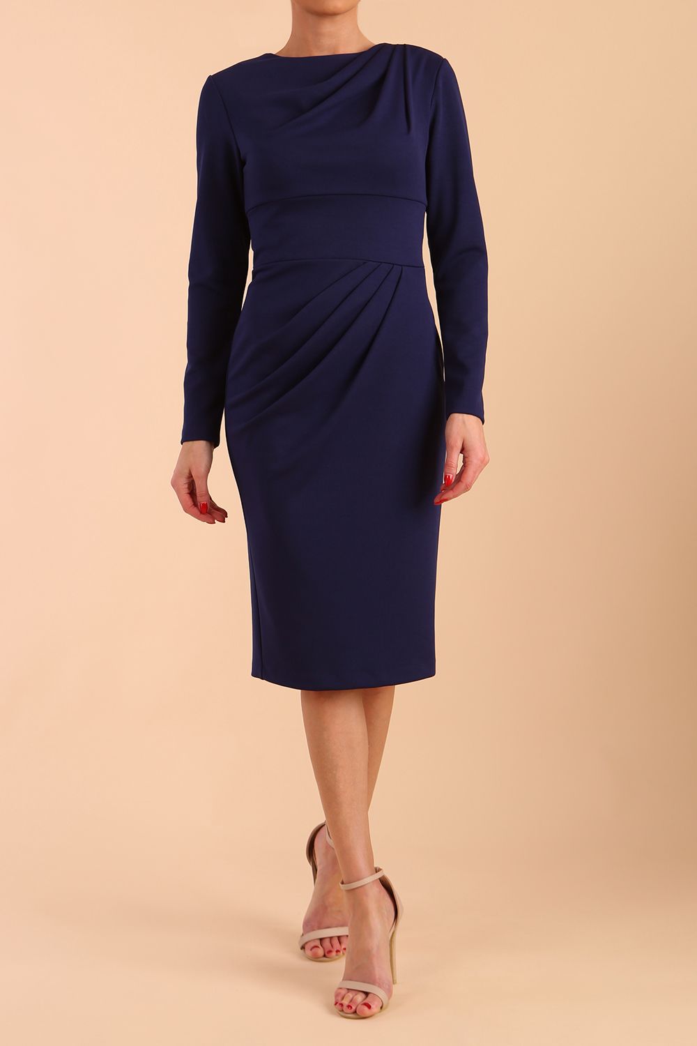 model wearing a diva catwalk Olgivy Long Sleeve Knee Length Pencil Dress round neckline and long sleeve in navy blue colour