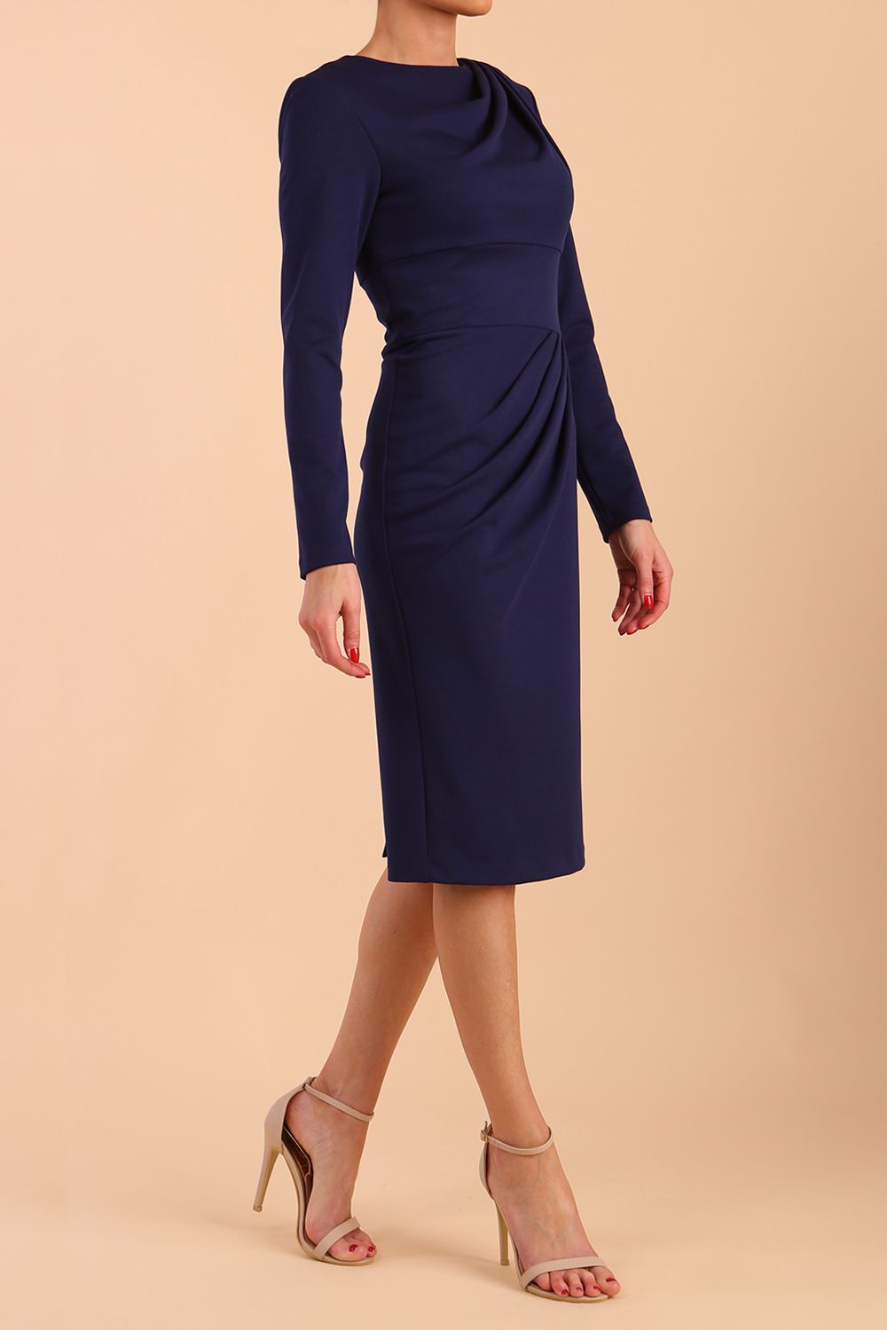 model wearing a diva catwalk Olgivy Long Sleeve Knee Length Pencil Dress round neckline and long sleeve in navy blue colour