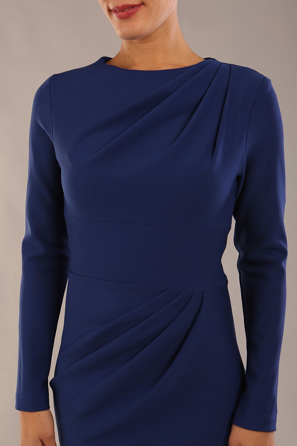 model wearing a diva catwalk Olgivy Long Sleeve Knee Length Pencil Dress round neckline and long sleeve in navy blue colour close up