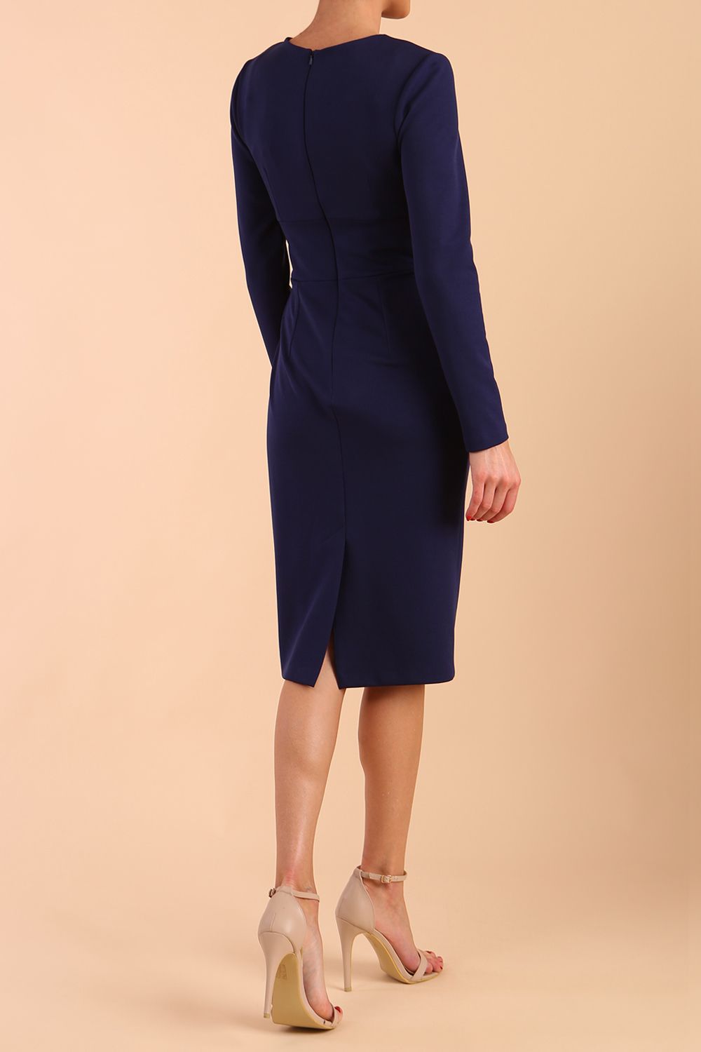 model wearing a diva catwalk Olgivy Long Sleeve Knee Length Pencil Dress round neckline and long sleeve in navy blue colour