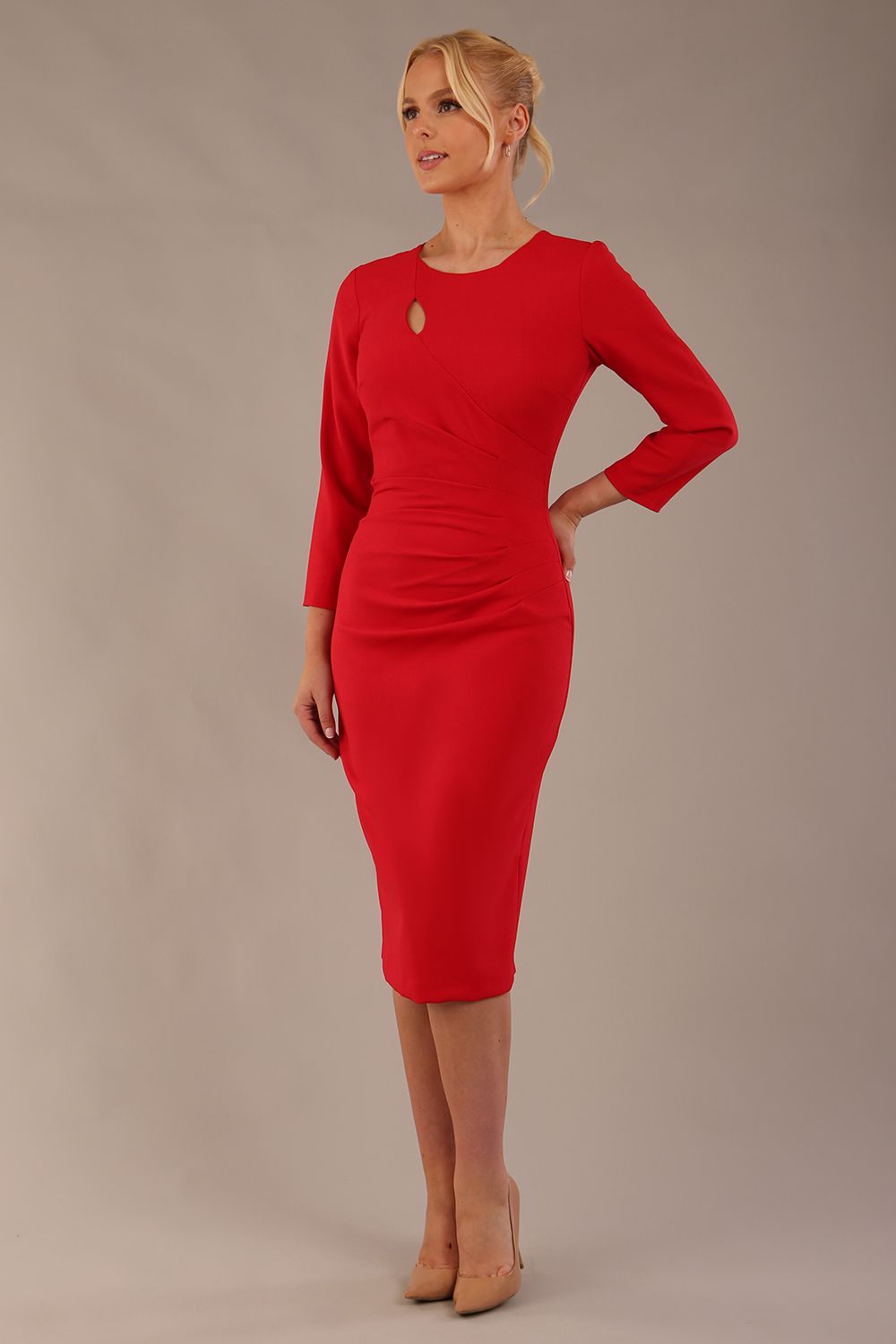 model is wearing diva catwalk miracle pencil dress with keyhole detail on a side of the front panel and gathering detail on a side or bodice panel with sleeves in scarlet red colour front (Scarlet Red)