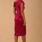 model is wearing diva catwalk casa blanca satin fuchsia pink pencil dress off shoulder design front