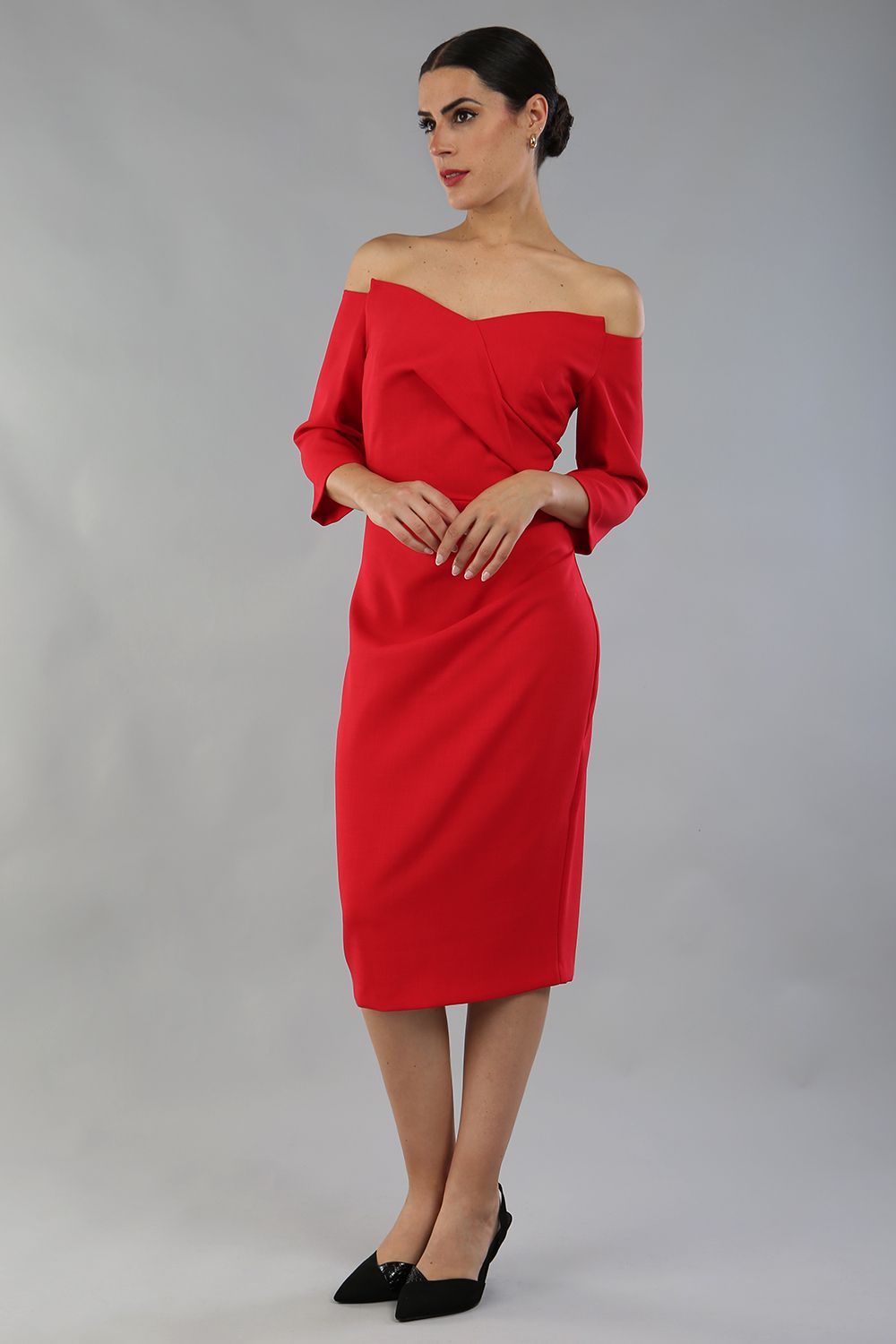 model is wearing diva catwalk lauren odd shoulder asymmetric neckline pencil dress with sleeves in scarlet red front