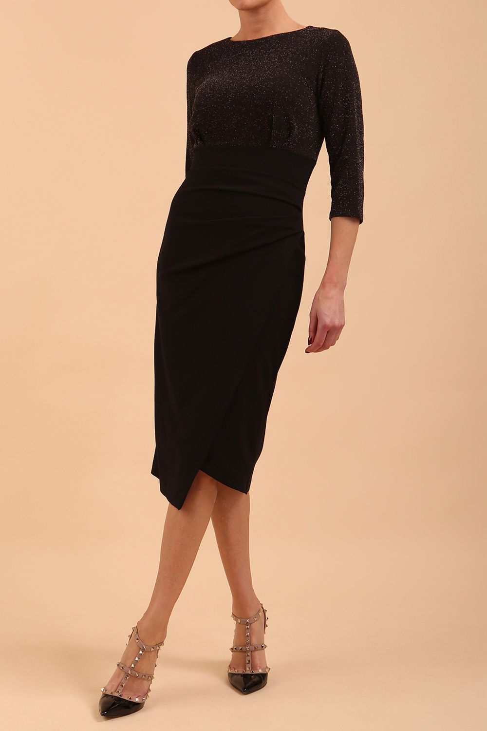 model is wearing diva catwalk contrast pencil dress with sleeve and assymetric skirt detail in black and black sparkle front