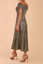 Model wearing diva catwalk Capri A-Line Midaxi Glitter Dress in Sherwood Glitter Gold back