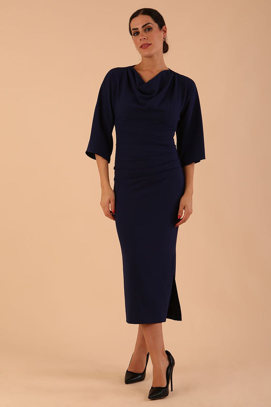 Model wearing diva catwalk Diana Cowl Neck pencil skirt dress in navy blue