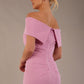 model is wearing diva catwalk amelia pencil dress with bardot neckline and ruched back in Dawn Pink (Dawn Pink)