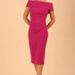 model is wearing diva catwalk amelia pencil dress with bardot neckline and ruched back in Magenta 