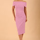 model is wearing diva catwalk amelia pencil dress with bardot neckline and ruched back in Dawn Pink